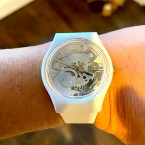 Women’s Swatch watch- exposed face.